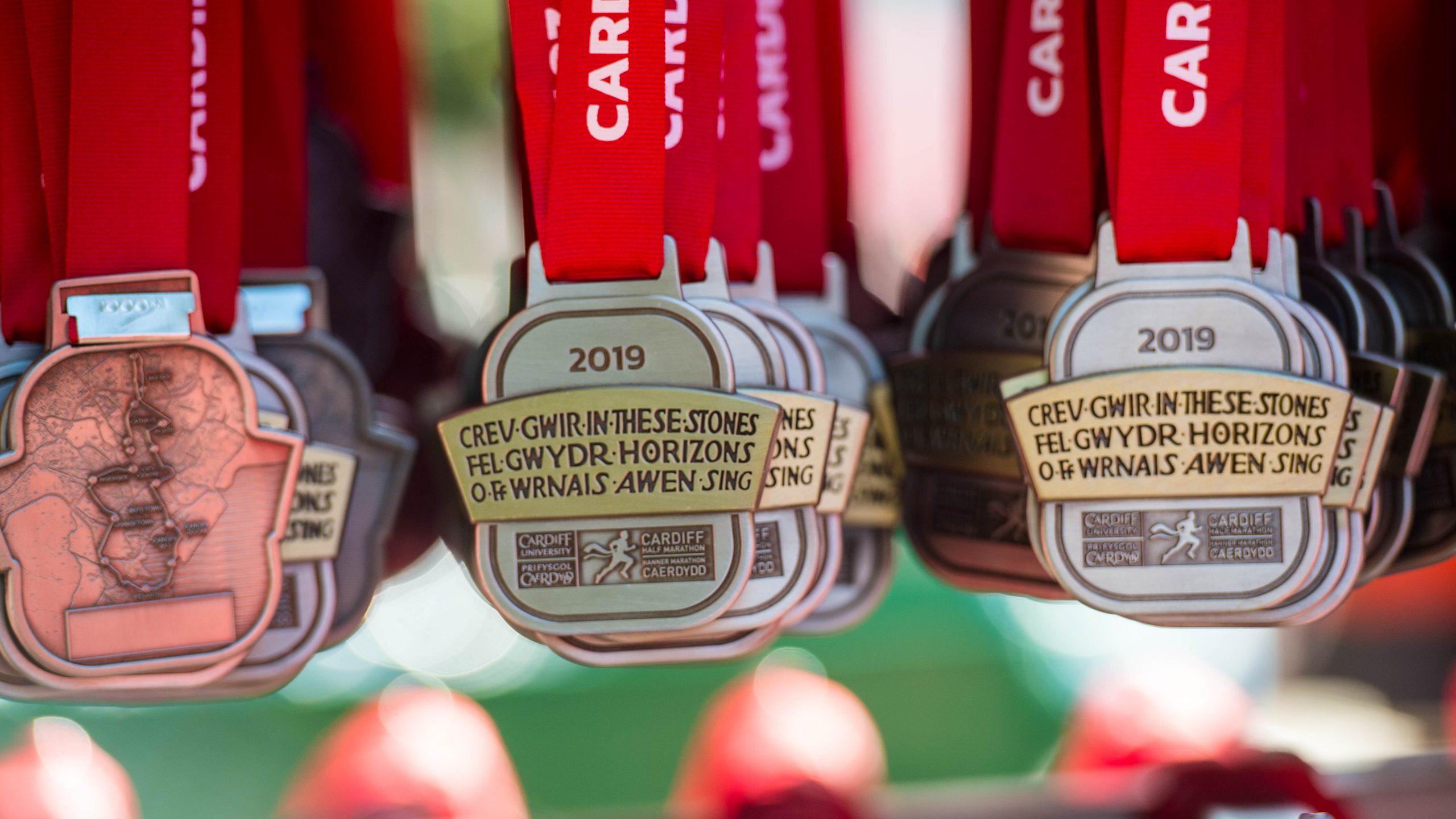 Cardiff Half Marathon medals hanging ready ready for the participants