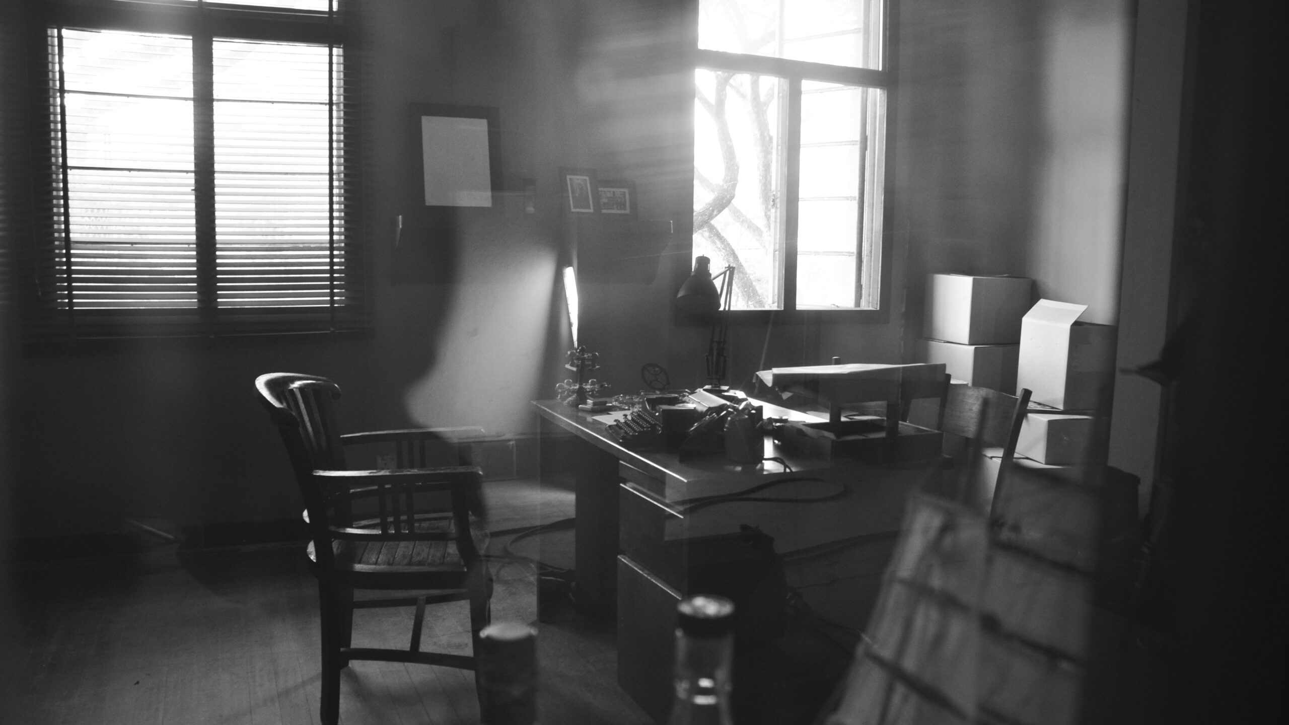 black and white photo of a detectives office